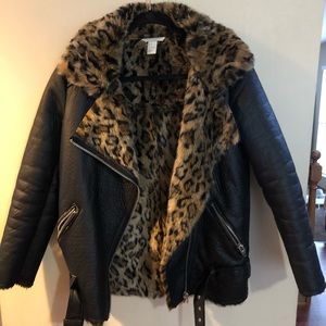 Faux fur lined faux belted leather jacket.
